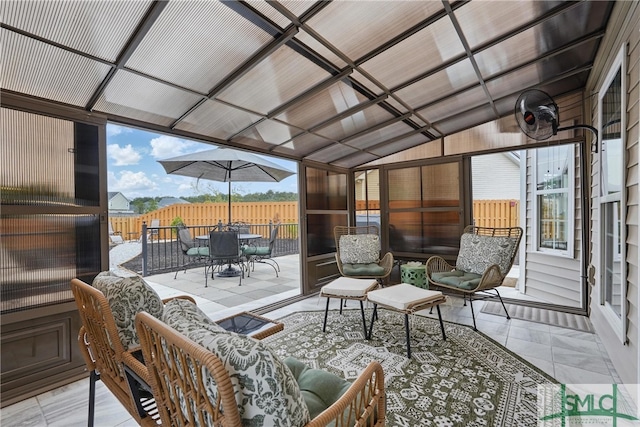 view of patio / terrace featuring fence and outdoor dining area