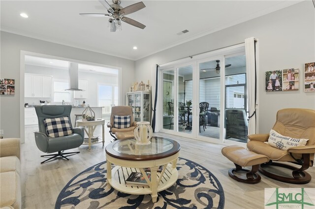 240 Blackjack Oak Dr W, Richmond Hill, GA 31324 - sitting room with a ceiling fan, light wood-style floors, crown molding, and recessed lighting