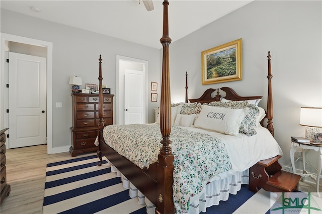 240 Blackjack Oak Dr W, Richmond Hill, GA 31324 - bedroom with light wood-style floors and baseboards