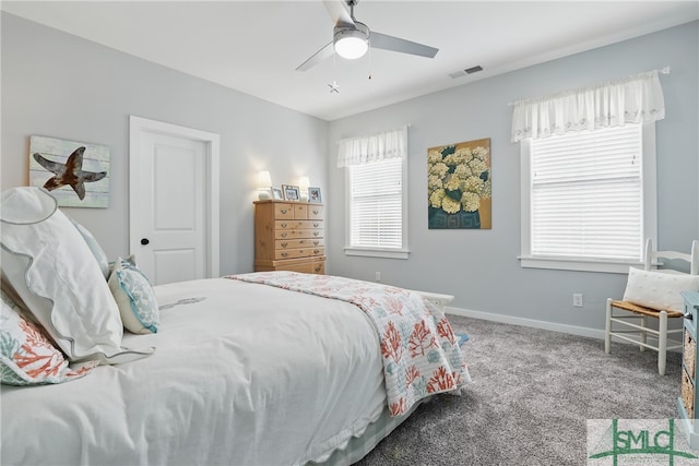 240 Blackjack Oak Dr W, Richmond Hill, GA 31324 - carpeted bedroom with baseboards and ceiling fan