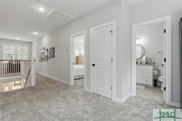 240 Blackjack Oak Dr W, Richmond Hill, GA 31324 - hall featuring attic access, light colored carpet, an upstairs landing, baseboards, and recessed lighting