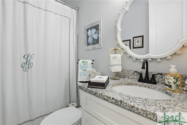240 Blackjack Oak Dr W, Richmond Hill, GA 31324 - full bathroom featuring vanity, toilet, and a shower with curtain