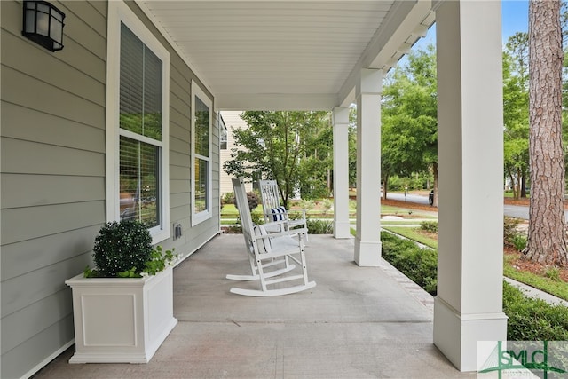 240 Blackjack Oak Dr W, Richmond Hill, GA 31324 - view of patio with covered porch