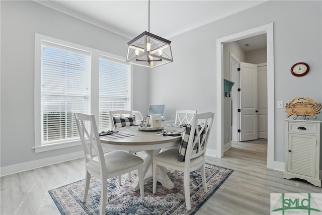 240 Blackjack Oak Dr W, Richmond Hill, GA 31324 - dining room with a chandelier, plenty of natural light, light wood finished floors, and baseboards