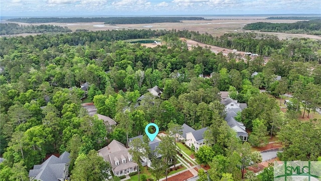 240 Blackjack Oak Dr W, Richmond Hill, GA 31324 - aerial view of residential area featuring a heavily wooded area