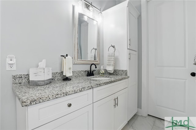 240 Blackjack Oak Dr W, Richmond Hill, GA 31324 - bathroom with marble look tiles and vanity