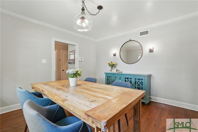 dining area with baseboards, ornamental molding, and dark wood-style floors