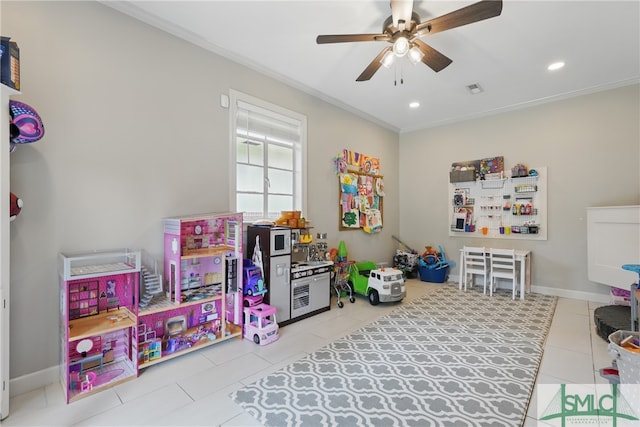 rec room featuring ornamental molding, ceiling fan, light tile patterned floors, recessed lighting, and baseboards