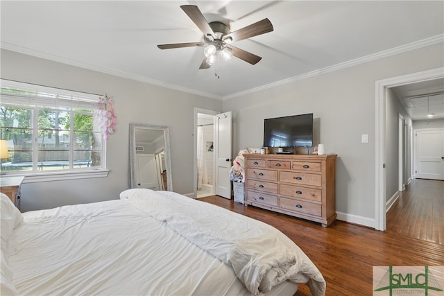 bedroom featuring attic access, ornamental molding, dark wood finished floors, baseboards, and a ceiling fan