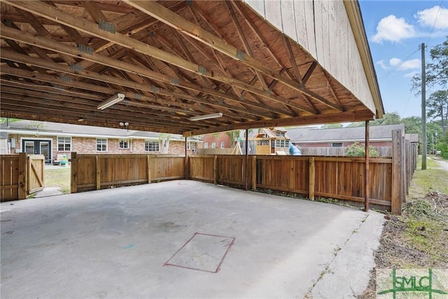 view of patio / terrace with french doors and fence