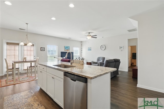 kitchen featuring dishwasher, a sink, ceiling fan, light stone countertops, and open floor plan