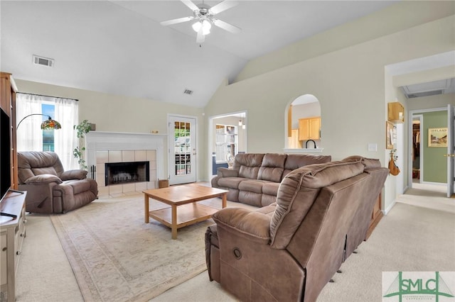 113 Taylor Ct, Richmond Hill, GA 31324 - living area with light colored carpet, ceiling fan, a fireplace, and lofted ceiling