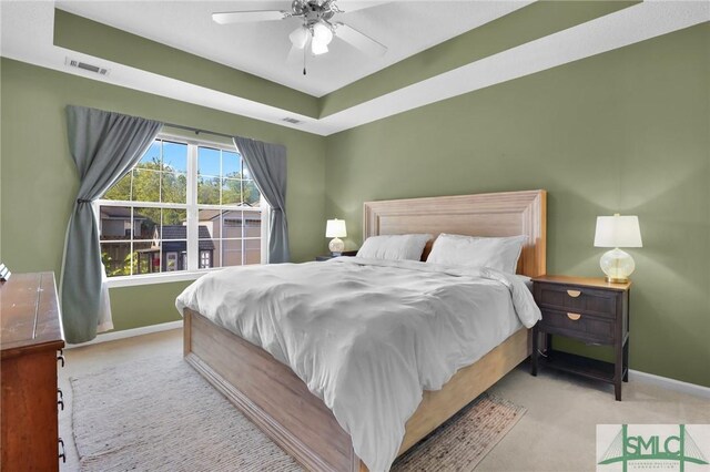 113 Taylor Ct, Richmond Hill, GA 31324 - bedroom featuring carpet floors, baseboards, and a raised ceiling