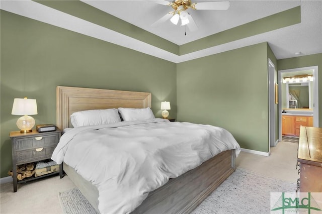 113 Taylor Ct, Richmond Hill, GA 31324 - bedroom featuring light colored carpet, baseboards, ceiling fan, and connected bathroom