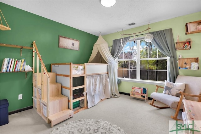113 Taylor Ct, Richmond Hill, GA 31324 - carpeted bedroom featuring baseboards and a textured ceiling