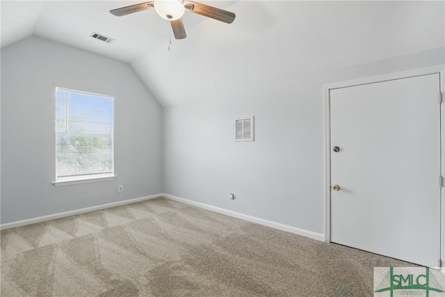 57 Cut Off Way, Richmond Hill, GA 31324 - additional living space with light colored carpet, lofted ceiling, a ceiling fan, and baseboards