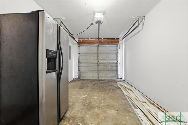 57 Cut Off Way, Richmond Hill, GA 31324 - garage featuring stainless steel refrigerator with ice dispenser