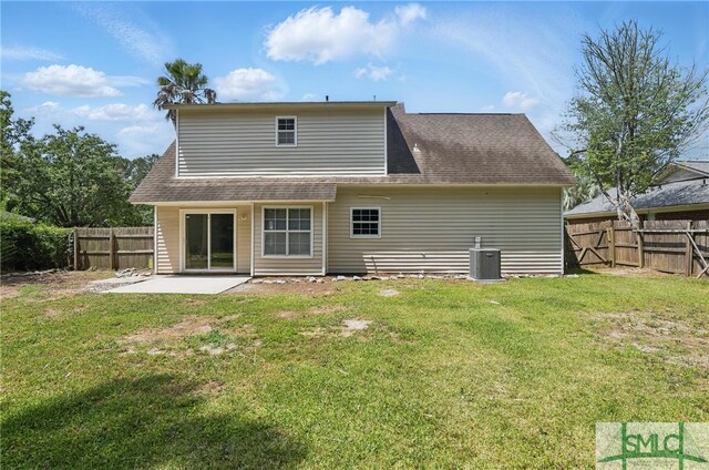 57 Cut Off Way, Richmond Hill, GA 31324 - back of house with a patio and roof with shingles