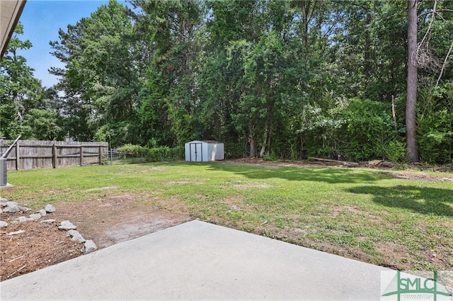 57 Cut Off Way, Richmond Hill, GA 31324 - view of yard featuring a patio area, a shed, and an outdoor structure