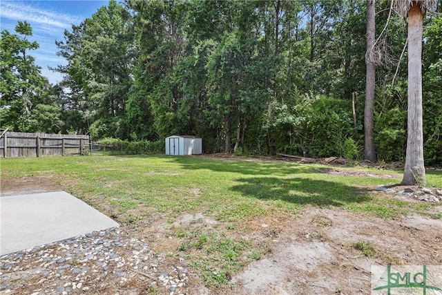57 Cut Off Way, Richmond Hill, GA 31324 - view of yard featuring a storage shed and an outbuilding
