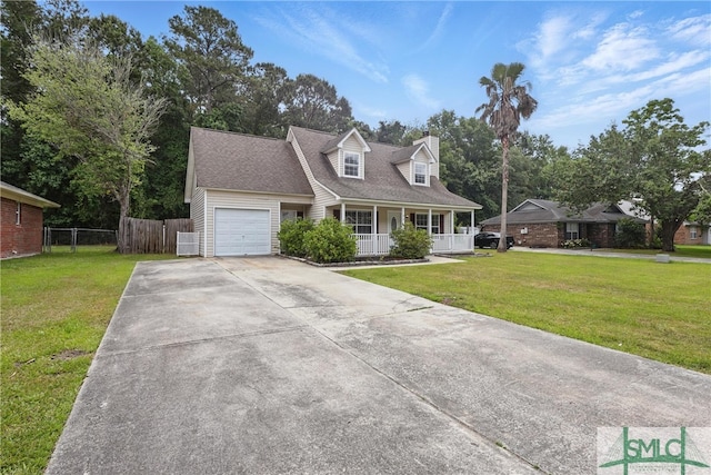 57 Cut Off Way, Richmond Hill, GA 31324 - cape cod house with a porch, a garage, driveway, and a chimney