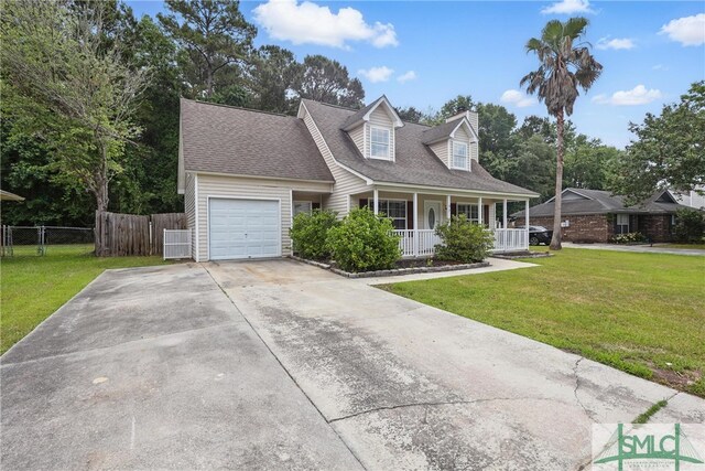 57 Cut Off Way, Richmond Hill, GA 31324 - cape cod home with a porch, a garage, concrete driveway, and a shingled roof