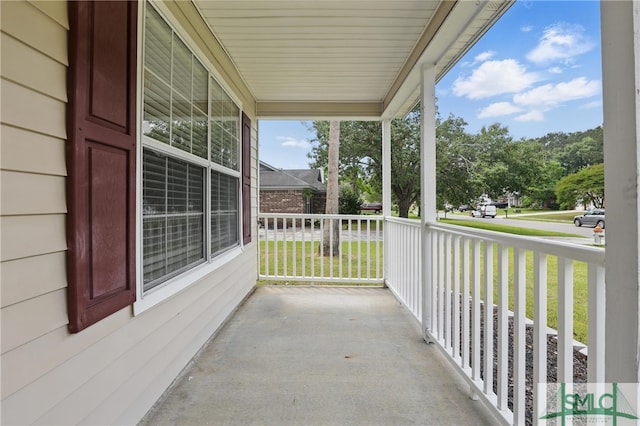 57 Cut Off Way, Richmond Hill, GA 31324 - balcony with covered porch