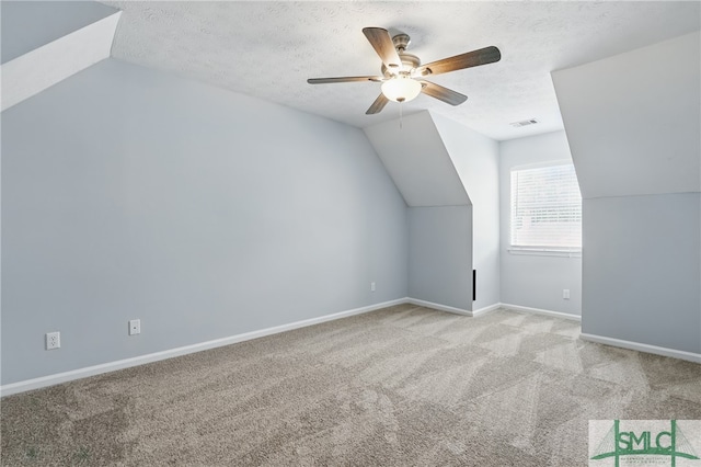 57 Cut Off Way, Richmond Hill, GA 31324 - bonus room featuring lofted ceiling, a ceiling fan, carpet, a textured ceiling, and baseboards