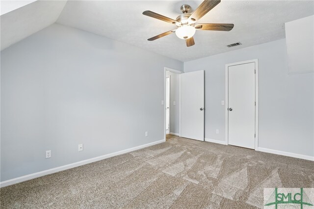 57 Cut Off Way, Richmond Hill, GA 31324 - unfurnished bedroom featuring carpet flooring, baseboards, and ceiling fan