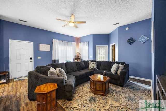 38 Travertine Cir, Savannah, GA 31419 - living room featuring wood finished floors, ceiling fan, and a textured ceiling