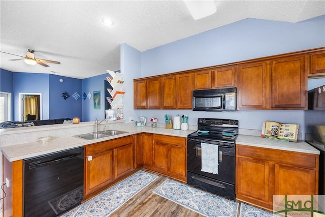 38 Travertine Cir, Savannah, GA 31419 - kitchen featuring black appliances, a sink, a textured ceiling, light countertops, and ceiling fan