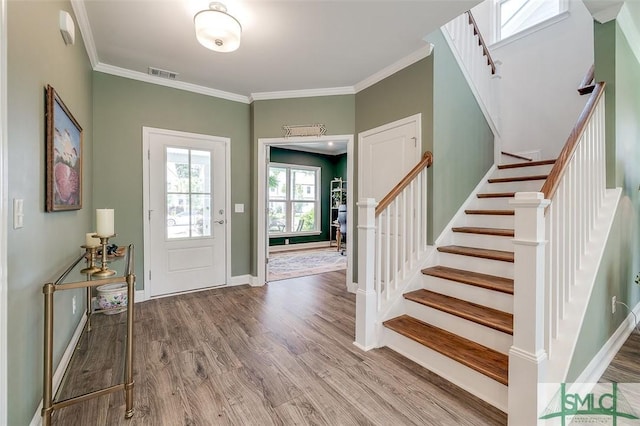 117 Canter Ct, Savannah, GA 31406 - foyer entrance featuring wood finished floors, stairway, ornamental molding, and baseboards