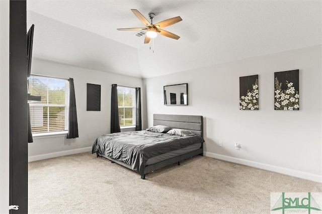 110 Richmond Pass Cir, Midway, GA 31320 - carpeted bedroom with baseboards, vaulted ceiling, and ceiling fan