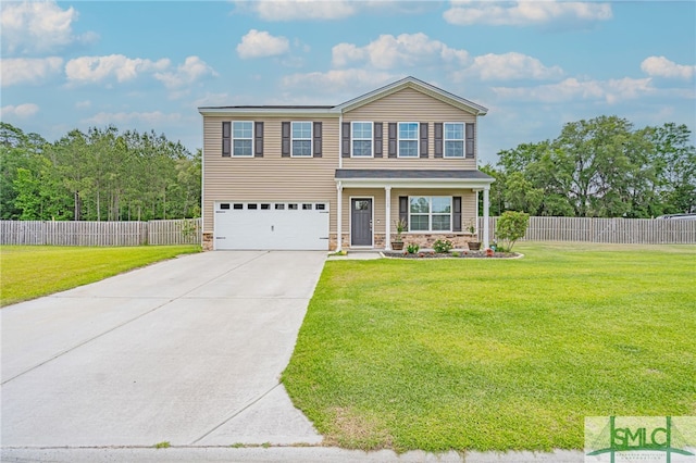 128 Greenbriar Dr, Guyton, GA 31312 - view of front of home with driveway, an attached garage, and covered porch