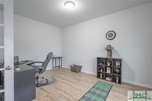128 Greenbriar Dr, Guyton, GA 31312 - home office featuring wood finished floors and baseboards