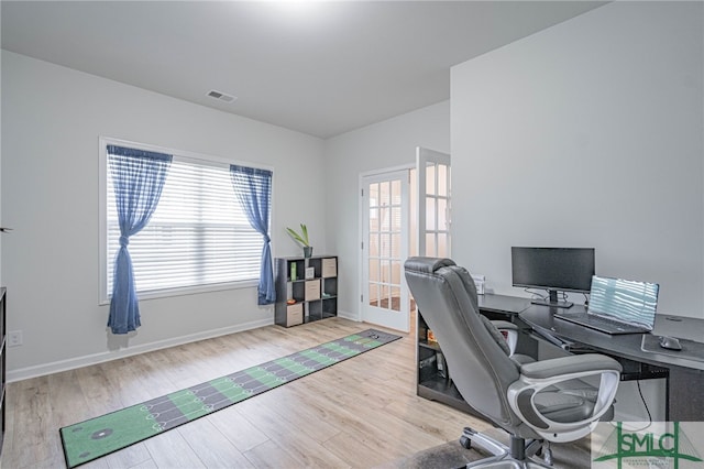 128 Greenbriar Dr, Guyton, GA 31312 - home office featuring wood finished floors and baseboards