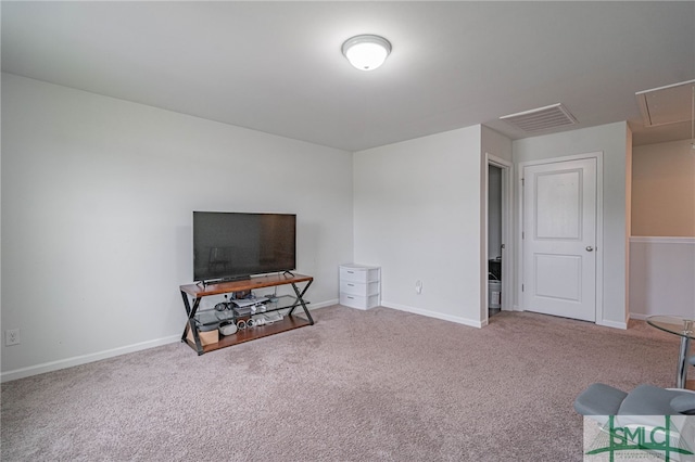128 Greenbriar Dr, Guyton, GA 31312 - living area featuring carpet floors, attic access, and baseboards