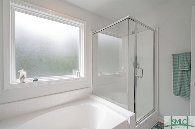 128 Greenbriar Dr, Guyton, GA 31312 - full bath featuring healthy amount of natural light, a stall shower, and a bath