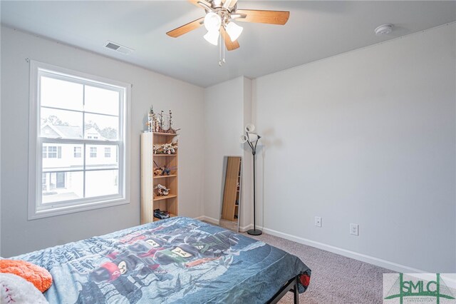 128 Greenbriar Dr, Guyton, GA 31312 - bedroom featuring carpet, baseboards, and ceiling fan