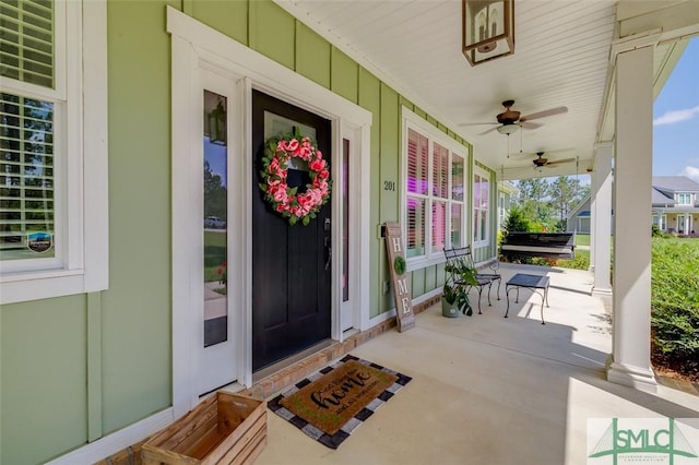 201 Cumberland Pt, Statesboro, GA 30458 - property entrance with covered porch, board and batten siding, and ceiling fan