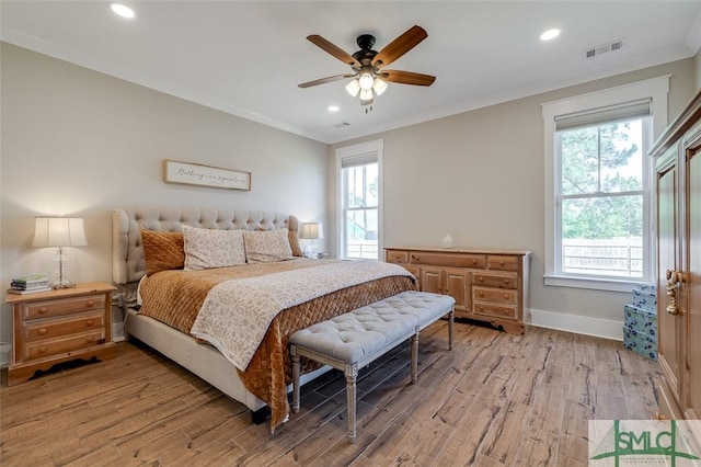 201 Cumberland Pt, Statesboro, GA 30458 - bedroom with light wood-style flooring, baseboards, recessed lighting, crown molding, and a ceiling fan