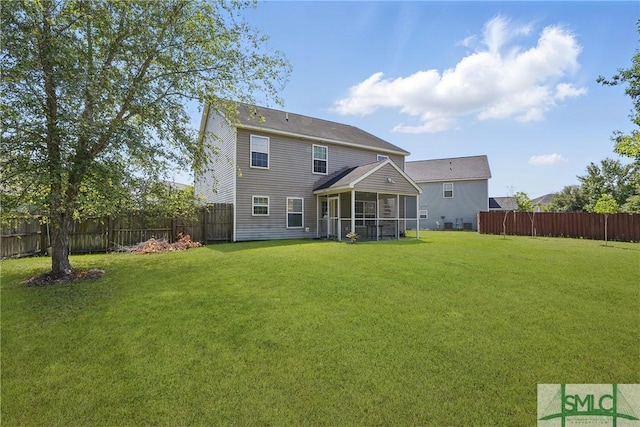 back of property featuring a sunroom