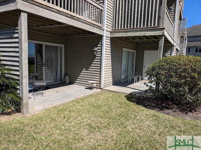 3005 River Dr Unit 401D, Savannah, GA 31404 - view of green lawn with a patio area and a balcony