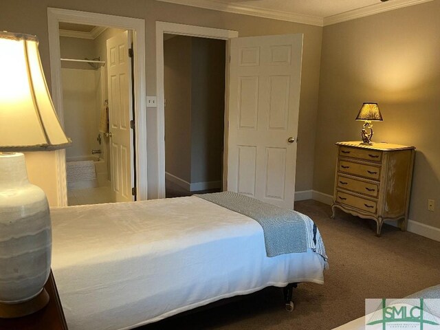 3005 River Dr Unit 401D, Savannah, GA 31404 - bedroom featuring crown molding, carpet flooring, and baseboards
