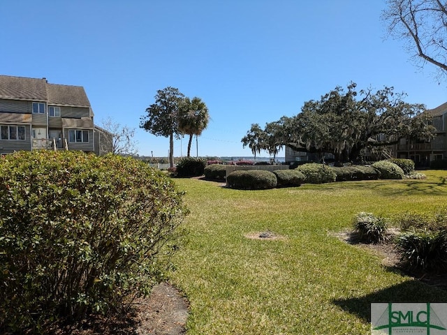 3005 River Dr Unit 401D, Savannah, GA 31404 - view of grassy yard