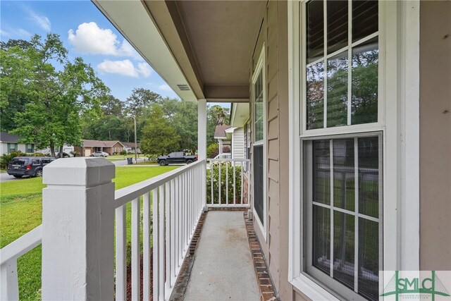 balcony featuring covered porch