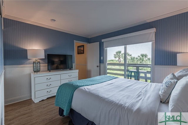 85 Van Horne Ave Unit 12A, Tybee Island, GA 31328 - bedroom with crown molding, wood finished floors, and wainscoting