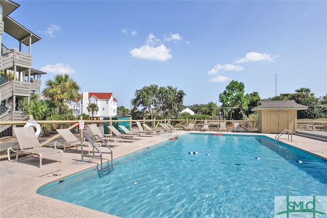 85 Van Horne Ave Unit 12A, Tybee Island, GA 31328 - community pool with a patio area