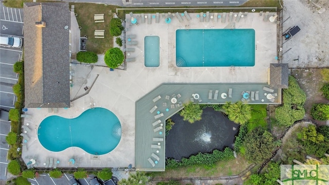 85 Van Horne Ave Unit 12A, Tybee Island, GA 31328 - drone / aerial view of a pool area