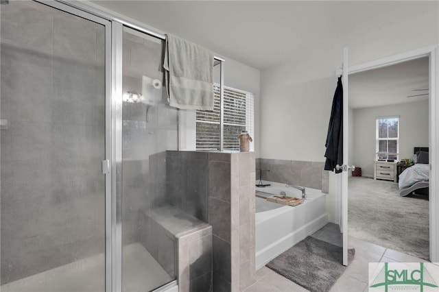 64 Southern Way, Richmond Hill, GA 31324 - bathroom with tile patterned flooring, a garden tub, a stall shower, and ensuite bathroom